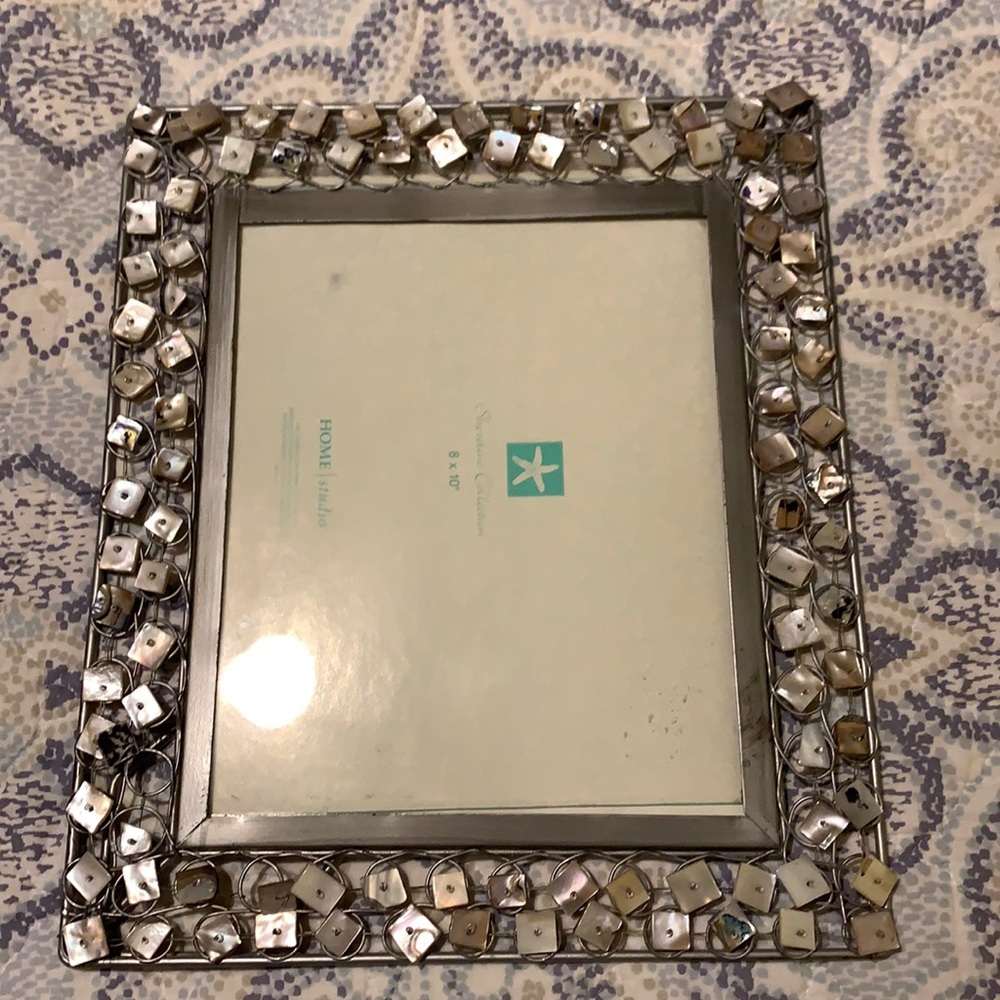 Like new silver metal & sea shell 8X10 frame
